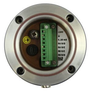 Close-up of an industrial sensor terminal with labeled connections and a green screw terminal block for Laser Level Transmitters inside a metal housing.